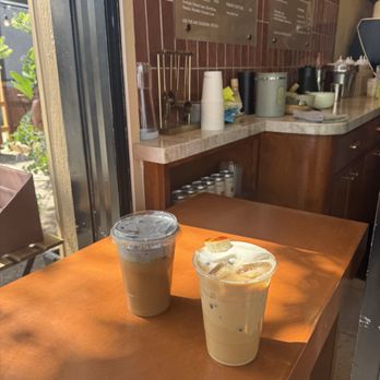 Galu Cafe and Delicatessen - Banana latte and black sesame latte - Coffee & Tea Near Me - Chula Vista, California Galu Cafe and Delicatessen - Banana latte and black sesame latte - Coffee & Tea Near Me - Chula Vista, California