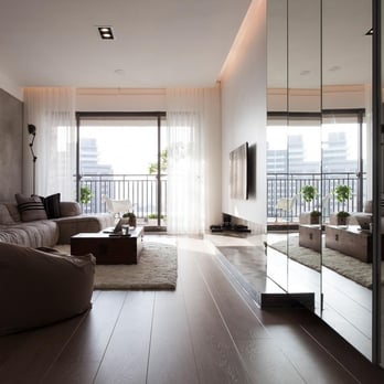 Deco27 - a modern living room with a view of the city - Flooring Near Me - Miami, Florida Deco27 - a modern living room with a view of the city - Flooring Near Me - Miami, Florida