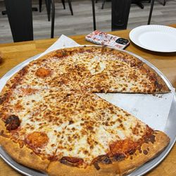 Milan's Pizza & Wings - extra large cheese pizza