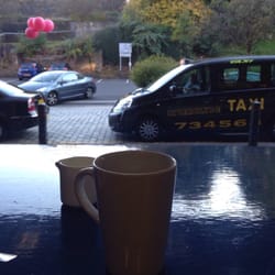 One 18 Caffe - Lovely street view with tables outside