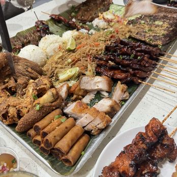 Tambayan - Family Lumpia (9) Pancit Overload Lechon Kawali Pork Adobo Fried Bangus / Milk Fish Chicken BBQ Skewers (6) Pork BBQ Skewers (6) - Filipino Near Me - Phoenix, Arizona Tambayan - Family Lumpia (9) Pancit Overload Lechon Kawali Pork Adobo Fried Bangus / Milk Fish Chicken BBQ Skewers (6) Pork BBQ Skewers (6) - Filipino Near Me - Phoenix, Arizona