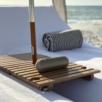 Naples Beach Cabanas - Naples beach cabanas daybeds with table, towels, and Bluetooth speaker - Beach Equipment Rentals Near Me