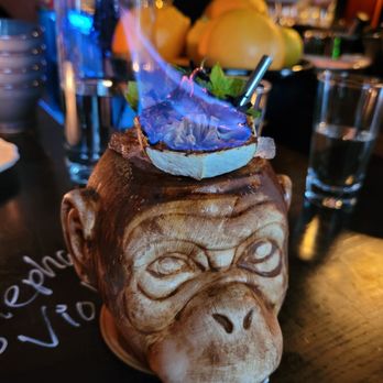 A bar called Gemma - Monkey March with Gemma dark rum, fortified turmeric  wine,  salted pumpkin seed orgeat, tiki spices, citrus - Cocktail Bars Near Me - Stockholm, Alberta