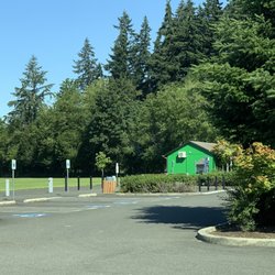 Parking lot, green building is the concession stands that are open during baseball season.