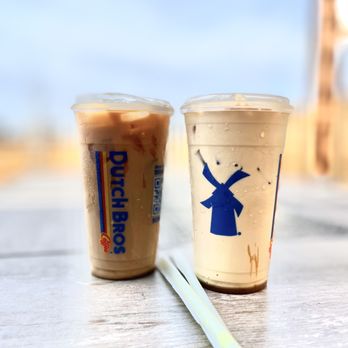 Dutch Bros Coffee - two cups of coffee on a table - Juice Bars & Smoothies Near Me - Fort Worth, Texas