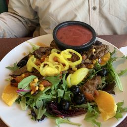 Steak salad might have a different name but it's a steak salad. Raspberry dressing was yummy Steak salad might have a different name but it's a steak salad. Raspberry dressing was yummy