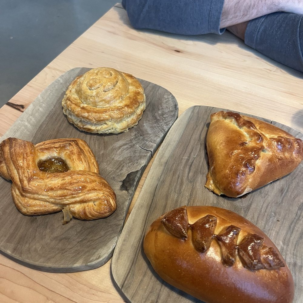 Pinoyshki Bakery & Cafe - Guava tart (BL), Sausage Pithivier (TL), Garlic Beef "Asado" (TR), grilled liempo (BR) - Bakeries Near Me - Seattle, Washington Pinoyshki Bakery & Cafe - Guava tart (BL), Sausage Pithivier (TL), Garlic Beef "Asado" (TR), grilled liempo (BR) - Bakeries Near Me - Seattle, Washington
