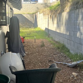 V V Greenland - Before work, yard covered in debris - Landscaping Near Me - Perris, California