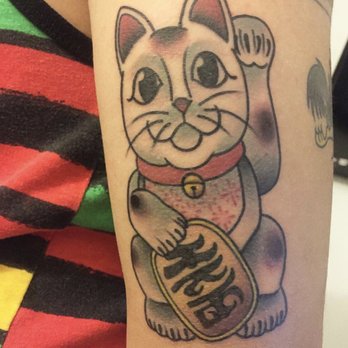 Flying Daggers Tattoo Parlor - Lucky cat tattoo done by Eric - Tattoo Near Me - Pomona, California
