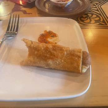 DanDan - Partially eaten egg roll - Asian Fusion Near Me - Milwaukee, Wisconsin