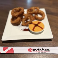 Xevichez - Calamari appetizer with spicy mayo dipping sauce.