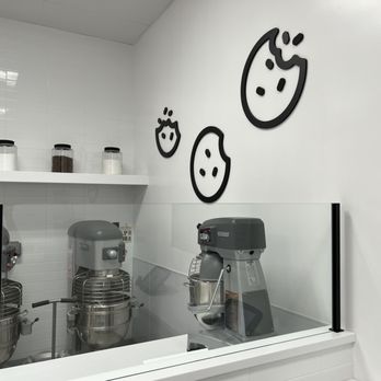 Crumbl - Miami Gardens - a kitchen counter with mixers and pots - Bakeries Near Me - Hialeah, Florida Crumbl - Miami Gardens - a kitchen counter with mixers and pots - Bakeries Near Me - Hialeah, Florida