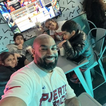 8-Bit Bites - The family enjoying the games and food - Burgers Near Me - Brooklyn, New York 8-Bit Bites - The family enjoying the games and food - Burgers Near Me - Brooklyn, New York