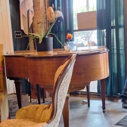 The Combine - Old piano by the entry.