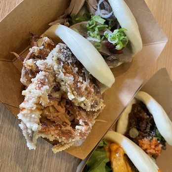 Fat Bao - close up on the whole soft shell crab in the bao - Chinese Near Me - Houston, Texas