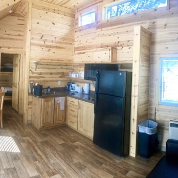 Mount Rushmore KOA - Kitchen of deluxe cabin. - Campgrounds Near Me - Hill City, South Dakota