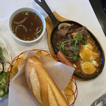 The Pho - Bo Ne - Vietnamese steak with pate, eggs, and a baguette. Does not come out on a sizzling plate, average - Vietnamese Near Me - Stockton, California