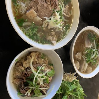 Pho 79 Restaurant - Super bowl pho and pho with meatballs (regular size) and tripes. Oxtail meat on the side. Lots of garnish, especially, basil - Vietnamese Near Me - Westminster, California