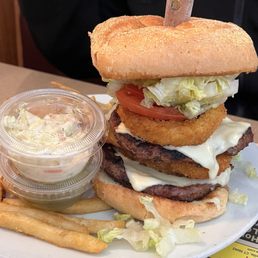 Big ole burger with huge onion rings!