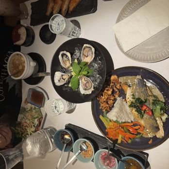 Khun Juk Oriental - Raw oyster with 4 different Thai style spices, grilled fish with a green curry, tum yum sweet and sour soup, avocado rolls. Thai iced tea. - Thai Near Me - Copenhagen, 84 Khun Juk Oriental - Raw oyster with 4 different Thai style spices, grilled fish with a green curry, tum yum sweet and sour soup, avocado rolls. Thai iced tea. - Thai Near Me - Copenhagen, 84