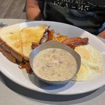 Tally's Silver Spoon - My dad's breakfast consisting of toast, hashbrowns, bacon, eggs, and gravy. - Desserts Near Me - Rapid City, South Dakota