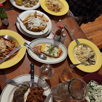 Rocco's Café - Grilled Flank Steak Calamari Fettuccine with Clams in white cream sauce Grilled Polenta Bolognese Fries Penne all'Arrabbiata (Vegan)) - Italian Near Me - San Francisco, California