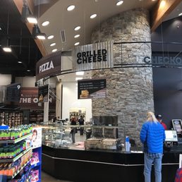 Food court area with Pizza, sushi, grilled cheese, cookies and ice cream Food court area with Pizza, sushi, grilled cheese, cookies and ice cream