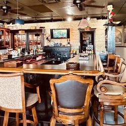 Comfortable captains chairs at our neighborhood bar!