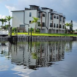 Land & Sea Masters - 540 linear foot seawall project including four docks and eight 10,000lb boat lifts.