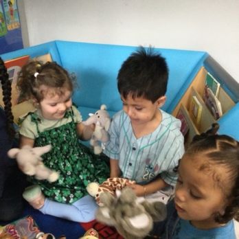 Sprouting Owls Daycare Center - Santiago playing with friends - Child Care & Day Care Near Me - Reston, Virginia Sprouting Owls Daycare Center - Santiago playing with friends - Child Care & Day Care Near Me - Reston, Virginia