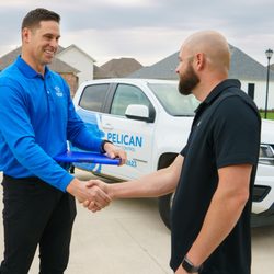 Pelican Pest Control - Pelican Pest Control employee shaking male customers hand