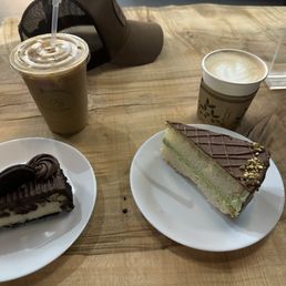 Pistacho cake and Oreo cheesecake with iced late and lavender oatmilk late