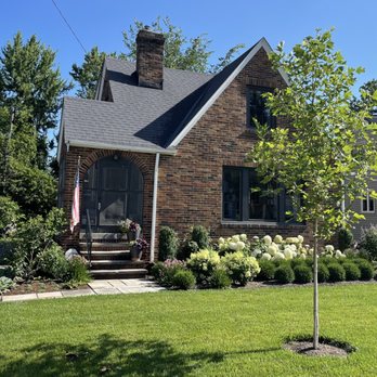 Wheatcraft Landscaping - the front of a brick house - Snow Removal Near Me Wheatcraft Landscaping - the front of a brick house - Snow Removal Near Me