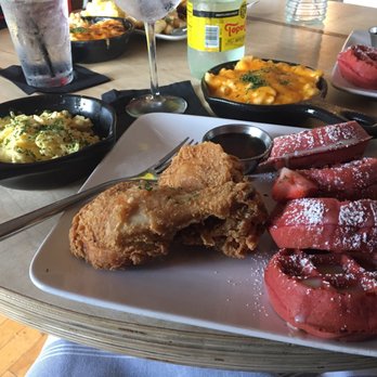 Taste Bar + Kitchen - Red velvet waffles with Cajun chicken, well done scrambled eggs with Mac and cheese. - Cocktail Bars Near Me - Houston, Texas Taste Bar + Kitchen - Red velvet waffles with Cajun chicken, well done scrambled eggs with Mac and cheese. - Cocktail Bars Near Me - Houston, Texas
