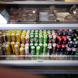 a display of sodas and soft drinks