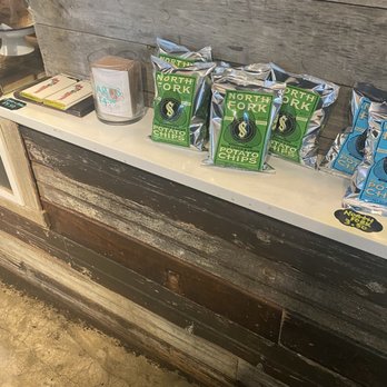 Whealth Kitchen - a counter with various items on it - Breakfast & Brunch Near Me - Jersey City, New Jersey