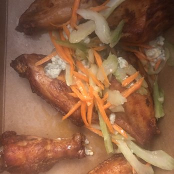 Ward 8 - Chicken wings with blue cheese sauce and some carrots and celery throw on top. - Cocktail Bars Near Me - Boston, Massachusetts Ward 8 - Chicken wings with blue cheese sauce and some carrots and celery throw on top. - Cocktail Bars Near Me - Boston, Massachusetts