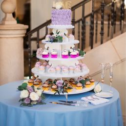 a wedding cake with cupcakes a wedding cake with cupcakes