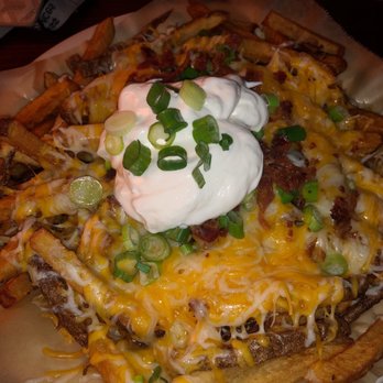 Loretta's Northwesterner - Irish nachos. Throw some hot sauce on it!!! - Dive Bars Near Me - Seattle, Washington