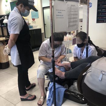 Nevada Nails & Spa - My nail lady had to step in and fix my moms feet. My moms nail girl was on the right & some random lady came over who was on the left - Waxing Near Me - Las Vegas, Nevada