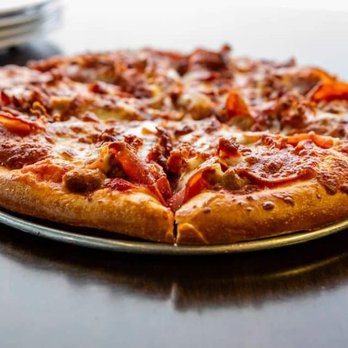 Wana Pizza - a whole pizza on a plate - Pizza Near Me - Wanatah, Indiana