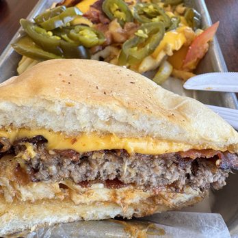 Bull Chicks - Spicy meat lovers burger with loaded waffle fries also - Burgers Near Me - Baton Rouge, Louisiana