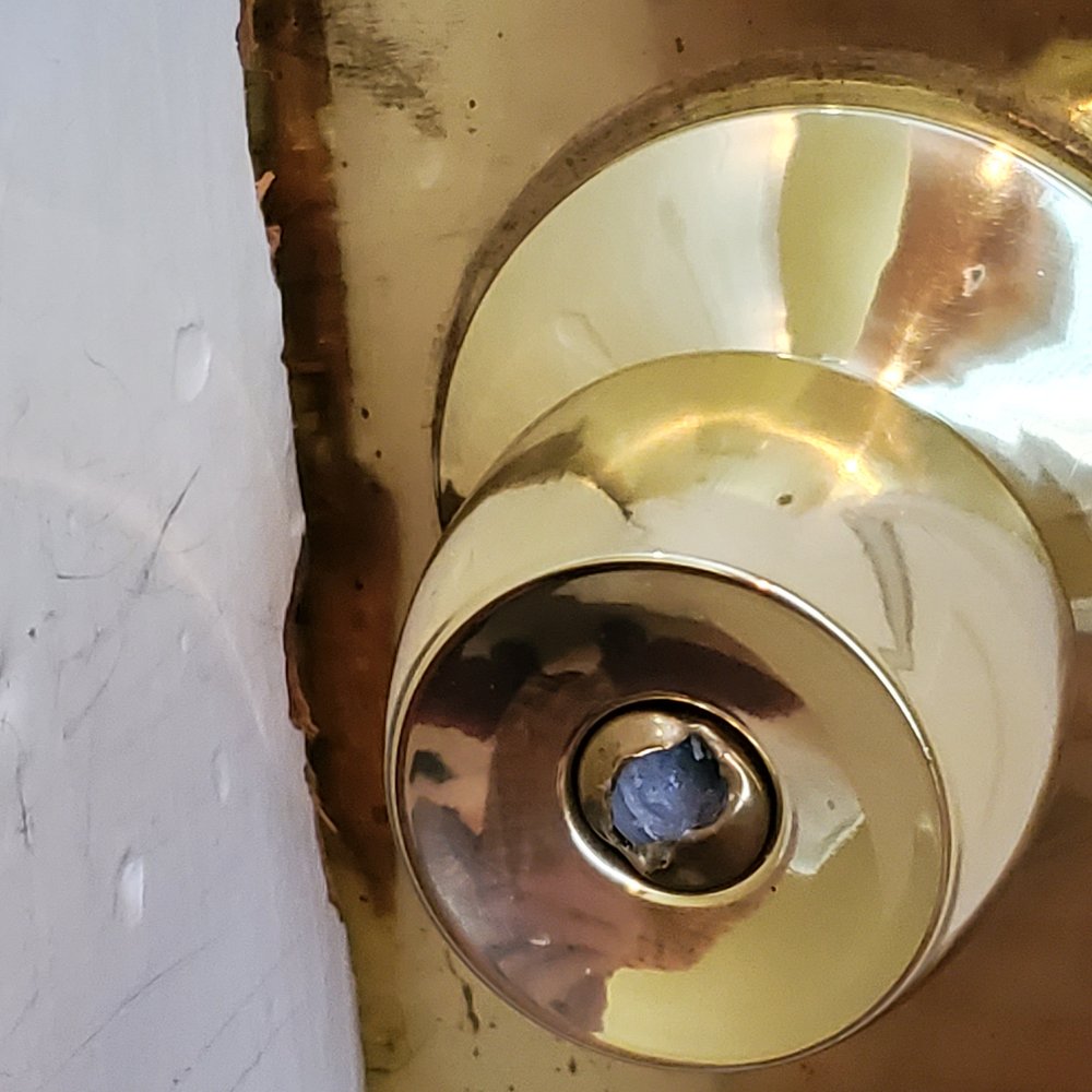 Heavily damaged lock to bathroom, rendering the bathroom unusable. Heavily damaged lock to bathroom, rendering the bathroom unusable.