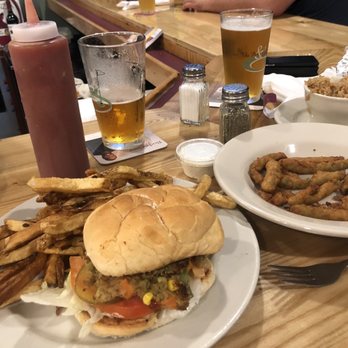 Par & Grill - a burger and fries on a table - American Near Me - Caribou, Maine Par & Grill - a burger and fries on a table - American Near Me - Caribou, Maine