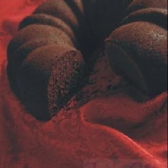 Zana Cakes - a chocolate bundt cake with a bite taken out of it - Bakeries Near Me - Philadelphia, Pennsylvania Zana Cakes - a chocolate bundt cake with a bite taken out of it - Bakeries Near Me - Philadelphia, Pennsylvania