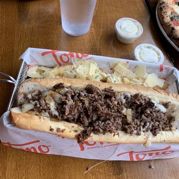 Tono Pizzeria + Cheesesteaks - South Philly Cheesesteak w/ truffle Parmesan fries - Pizza Near Me - Saint Paul, Minnesota Tono Pizzeria + Cheesesteaks - South Philly Cheesesteak w/ truffle Parmesan fries - Pizza Near Me - Saint Paul, Minnesota
