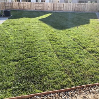 Mission View Landscaping - Grass and river rock boarder - Landscaping Near Me