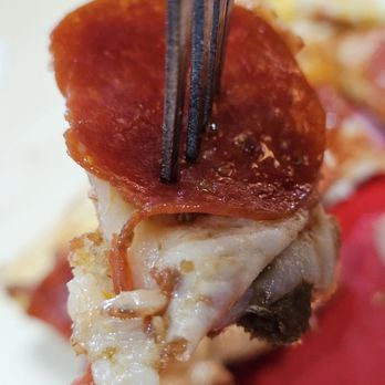 Cicis Pizza - A fork with a piece of one of the slices of pizza I enjoyed in the restaurant. - Pizza Near Me - Roanoke, Virginia Cicis Pizza - A fork with a piece of one of the slices of pizza I enjoyed in the restaurant. - Pizza Near Me - Roanoke, Virginia