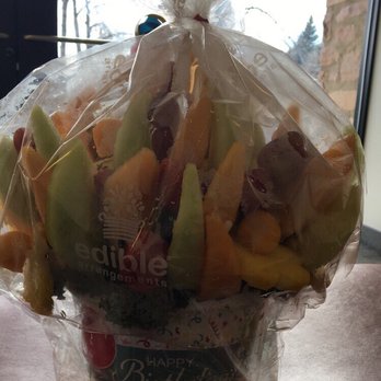 Edible Arrangements - a basket of fruit in plastic wrap - Gift Shops Near Me - Boulder, Colorado