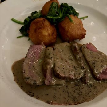 Chez Maggy - Duck in pepper sauce with potatoes au dauphine - French Near Me - Denver, Colorado